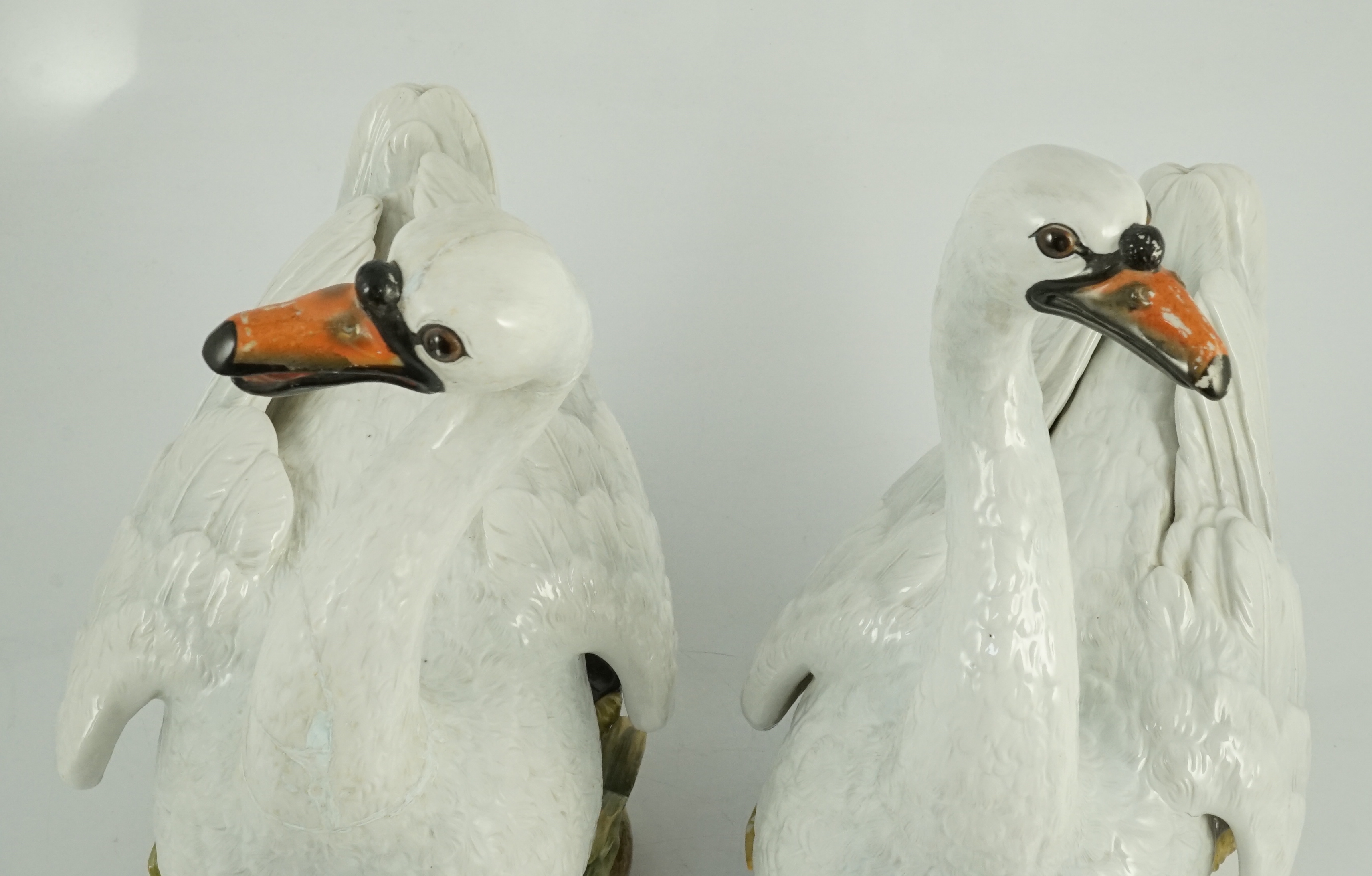 A pair of large Meissen models of swans, 19th century, one neck restored